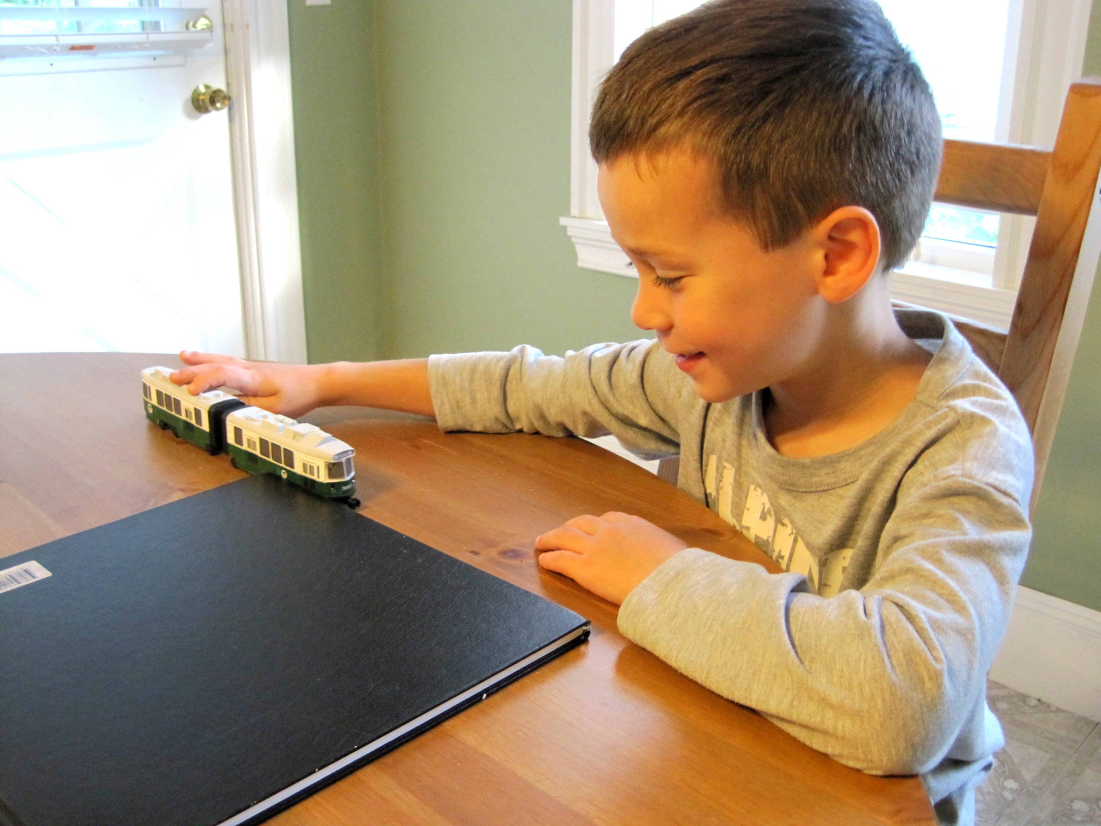 Boy with MBTA Toy